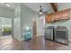 Laundry room with tile floors, washer, dryer, and cabinets at 5317 Burning Oak Ct, Raleigh, NC 27606