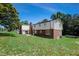 Ranch-style home with brick and siding exterior at 76 Traceway N, Sanford, NC 27332