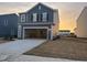 Two-story home with two-car garage in a new home community at 109 N Keatts Winner Ct, Clayton, NC 27520