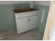 Modern bathroom vanity with new cabinet and unfinished floor at 114 Arundel Dr, Archer Lodge, NC 27527