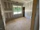 A bedroom under construction with natural light and ready for customization at 114 Arundel Dr, Archer Lodge, NC 27527