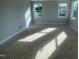 Bedroom with two large windows bringing in ample natural light at 114 Arundel Dr, Archer Lodge, NC 27527