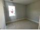 Bright bedroom with large window providing ample natural light at 114 Arundel Dr, Archer Lodge, NC 27527