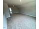 Spacious bonus room with neutral carpet, offering versatility for various uses at 114 Arundel Dr, Archer Lodge, NC 27527