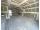 Open-concept living space under construction with bright natural light at 114 Arundel Dr, Archer Lodge, NC 27527