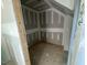 Unfinished storage area showing drywall and basic framing at 114 Arundel Dr, Archer Lodge, NC 27527