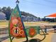 View of community playground featuring interactive play elements, and instruments at 136 Weavers Grove Dr, Chapel Hill, NC 27514