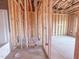 View of bathroom with the plumbing roughed-in during the construction phase, showing wood studs at 203 Pond Vw Ct # 1, Fuquay Varina, NC 27526