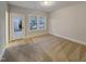 Neutral bedroom with carpet and a door to the exterior at 203 Pond Vw Ct # 1, Fuquay Varina, NC 27526