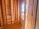 View looking through a framed doorway showing a door and an incomplete yard at 203 Pond Vw Ct # 1, Fuquay Varina, NC 27526