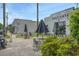 Cultivate Coffee Roastery exterior with outdoor seating on a sunny day at 205 Pond Vw Ct # 2, Fuquay Varina, NC 27526