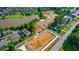 Aerial view of the community showcasing the lake, walking trails, and available homesites at 207 Pond View Ct # 3, Fuquay Varina, NC 27526