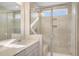 Modern bathroom features a glass-enclosed shower with tile surround, niche, and bench at 207 Pond View Ct # 3, Fuquay Varina, NC 27526