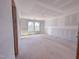 Bedroom featuring bright windows, perfect for creating a relaxing retreat tailored to your style at 207 Pond View Ct # 3, Fuquay Varina, NC 27526
