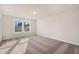 Neutral bedroom with double window offering lots of natural light and carpeted floor at 207 Pond View Ct # 3, Fuquay Varina, NC 27526