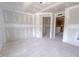 Spacious room prepped for finishes, showing open entryways and ample space for a bedroom or living area at 207 Pond View Ct # 3, Fuquay Varina, NC 27526