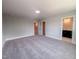 Large bedroom boasts neutral colors, with views to a walk in closet and bathroom at 207 Pond View Ct # 3, Fuquay Varina, NC 27526