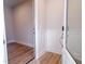 Entryway shows stylish wainscoting, and a glass front door with an adjacent coat closet at 207 Pond View Ct # 3, Fuquay Varina, NC 27526