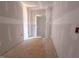 Unfinished hallway with installed door at 207 Pond View Ct # 3, Fuquay Varina, NC 27526