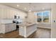 Modern kitchen featuring granite countertops, stainless steel appliances, and pendant lighting over the island at 207 Pond View Ct # 3, Fuquay Varina, NC 27526