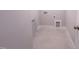 Bright laundry room featuring hook ups and ceramic tile flooring at 207 Pond View Ct # 3, Fuquay Varina, NC 27526