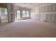 Large living room showing outdoor access, a blank canvas ready for custom design and finishes at 207 Pond View Ct # 3, Fuquay Varina, NC 27526