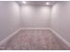 Neutral room featuring plush carpeting, neutral walls, and recessed lighting at 207 Pond View Ct # 3, Fuquay Varina, NC 27526