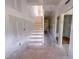 Unfinished stairway wrapped for protection during construction at 207 Pond View Ct # 3, Fuquay Varina, NC 27526