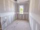 Bright bathroom space with a window and plumbing in place, ready for customization and the addition of stylish fixtures at 209 Pond View Ct # 4, Fuquay Varina, NC 27526