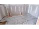 Modern bathroom with installed gray floor tiles and unfinished walls at 209 Pond View Ct # 4, Fuquay Varina, NC 27526