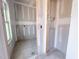 Unfinished bathroom featuring a window for natural light and plumbing fixtures, ready to be transformed into a relaxing oasis at 209 Pond View Ct # 4, Fuquay Varina, NC 27526