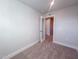 Open bedroom leading to another room, featuring plush carpet at 209 Pond View Ct # 4, Fuquay Varina, NC 27526