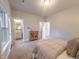 Bedroom featuring carpet, natural light, and ensuite bathroom access at 209 Pond View Ct # 4, Fuquay Varina, NC 27526