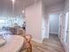 Open floor plan dining area with views of the kitchen and living room at 209 Pond View Ct # 4, Fuquay Varina, NC 27526