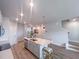 Contemporary kitchen features a center island with bar seating and stainless steel appliances at 209 Pond View Ct # 4, Fuquay Varina, NC 27526