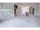 Expansive living room space connected to other rooms, ideal for entertaining and comfortable living in a modern home at 209 Pond View Ct # 4, Fuquay Varina, NC 27526