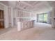 Spacious living room under construction with natural light, offering a versatile area for relaxation and entertainment at 209 Pond View Ct # 4, Fuquay Varina, NC 27526