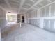 Bright living room featuring large windows and an open layout, providing ample space for customization and decor at 209 Pond View Ct # 4, Fuquay Varina, NC 27526