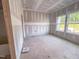 New room with bright windows and drywall ready for your personal touch at 209 Pond View Ct # 4, Fuquay Varina, NC 27526