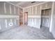 Unfinished room ready for customization, showing electrical setup and layout at 209 Pond View Ct # 4, Fuquay Varina, NC 27526