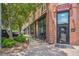 Charming brick building with outdoor seating, showcasing architectural detail and street appeal at 209 Pond View Ct # 4, Fuquay Varina, NC 27526