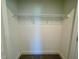 Walk-in closet featuring neutral walls, carpet, and a wire rack for storage at 262 Grand Griffon Way, Lillington, NC 27546