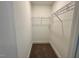 Walk-in closet featuring neutral walls, carpet, and a wire rack for storage at 262 Grand Griffon Way, Lillington, NC 27546
