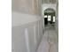 Hallway displaying fresh drywall and an arched entryway leading to the back of the home at 262 Grand Griffon Way, Lillington, NC 27546