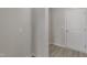 Clean hallway with light gray walls and wood flooring at 262 Grand Griffon Way, Lillington, NC 27546