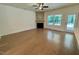 Spacious living room with hardwood floors, fireplace and views of the back deck at 262 Grand Griffon Way, Lillington, NC 27546