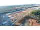 Aerial view of Crescent Mills community, showcasing new homes and open space at 268 Babbling Brook Dr, Clayton, NC 27520