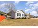 Well-maintained home exterior with manicured landscaping and a neatly kept lawn at 3332 Castlegate Dr, Raleigh, NC 27616