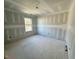 Unfinished bedroom with window at 45 Covey Rise Way, Lillington, NC 27546