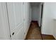 Unfinished hallway with doors to bedrooms and bath at 45 Covey Rise Way, Lillington, NC 27546